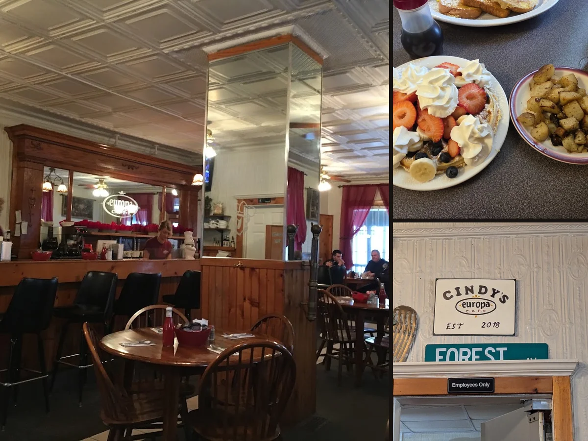 Cozy café tables with breakfast plates
