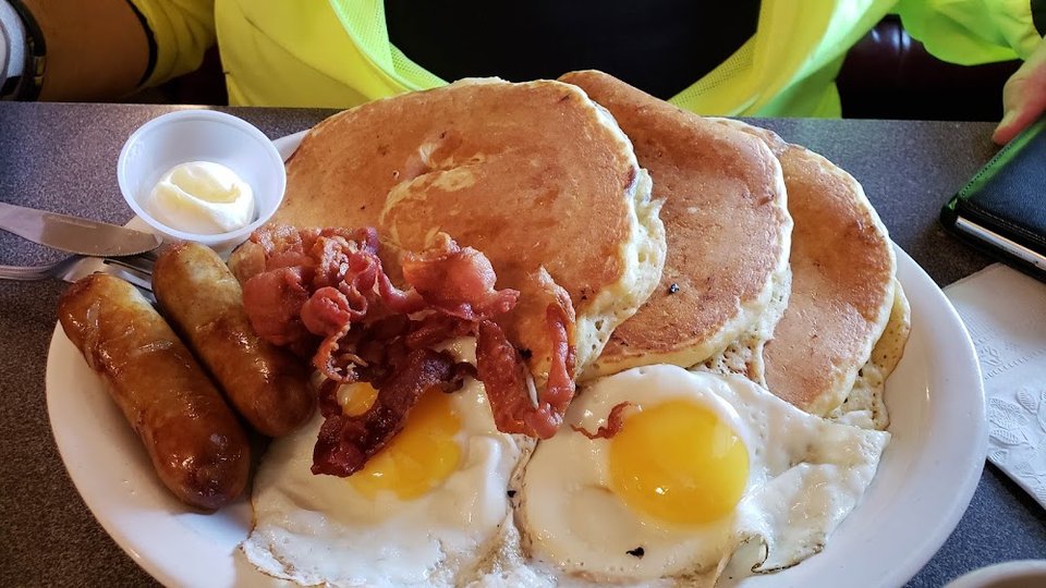 Breakfast menu with eggs and coffee